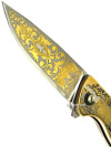 Складной нож на подшипнике позолоченный с гравюрой "Олени" в подарочном футляре